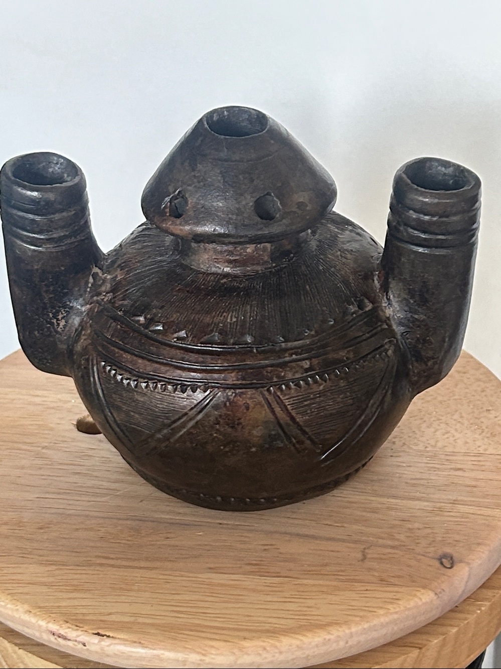 This appears vintage Hausa clay ink pot from Nigeria West African handcrafted
